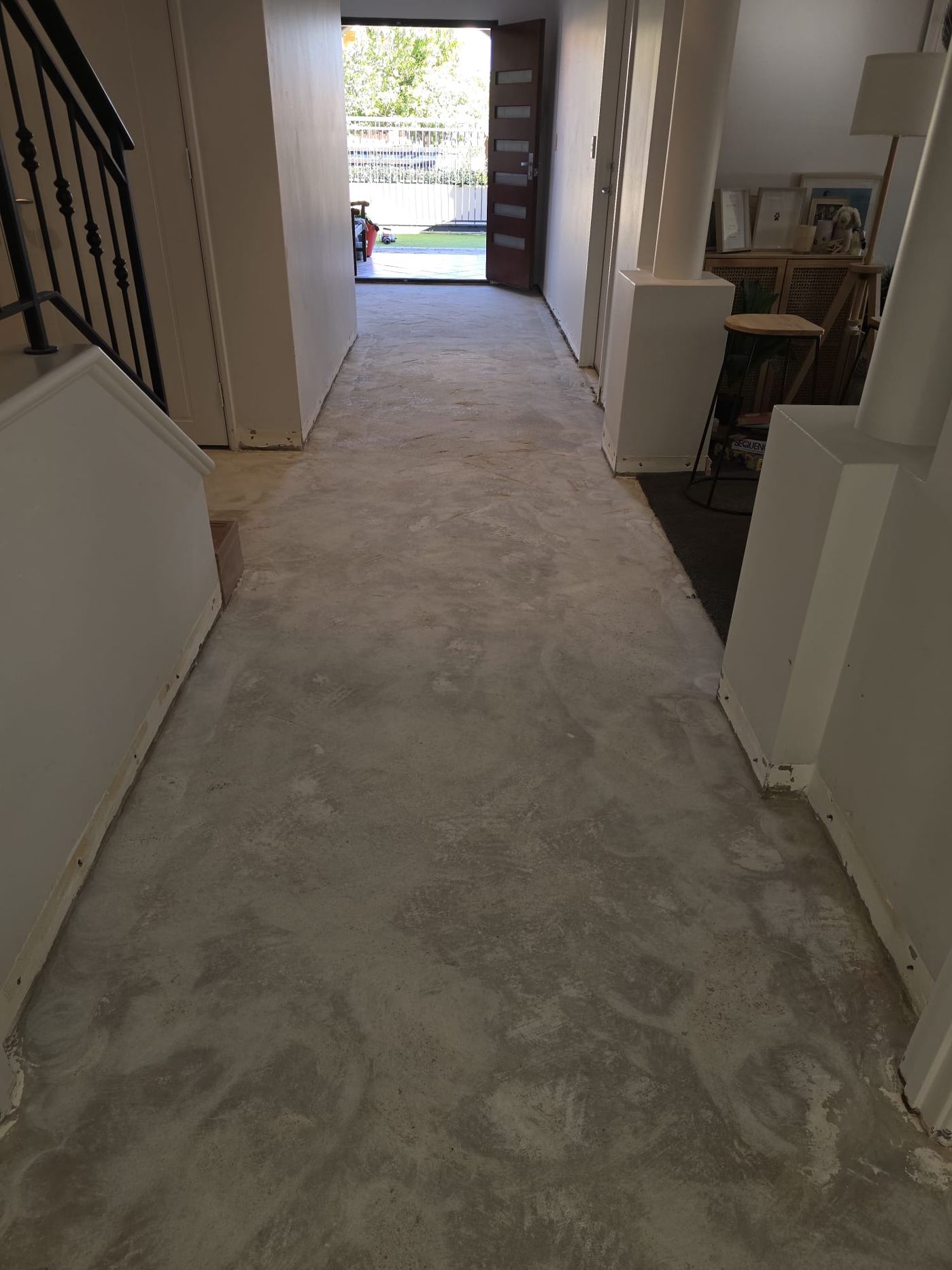 Hallway floor after tile removal and clean-up, Janet Street